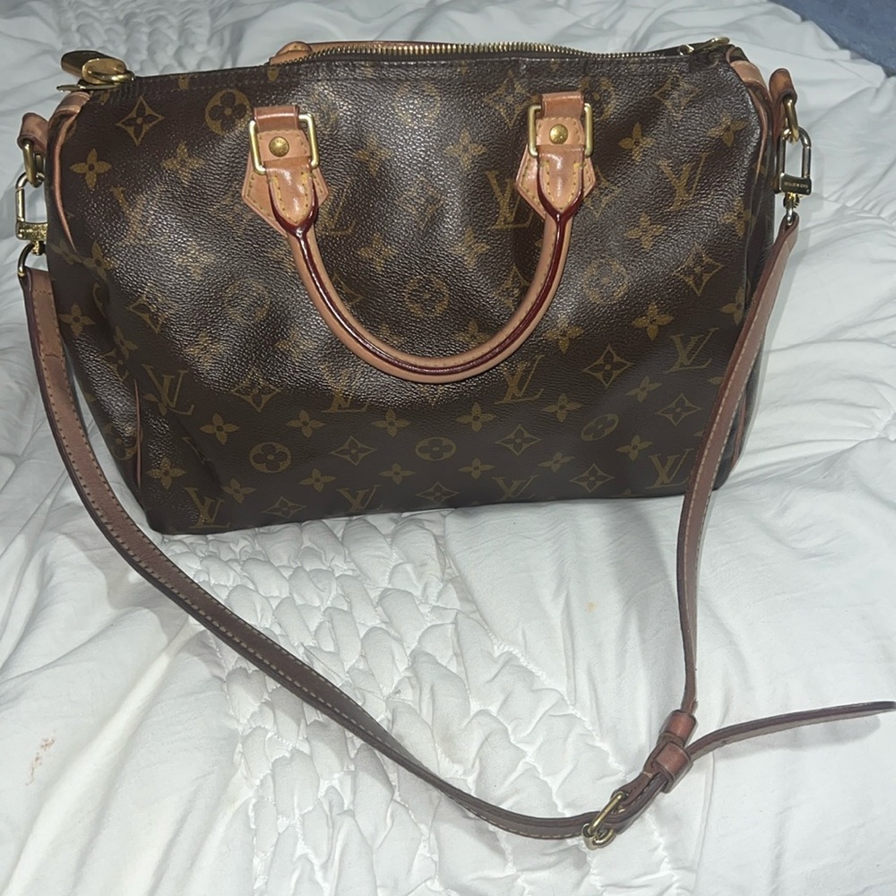 Louis Vuttion Speedy 30 bandouliere.